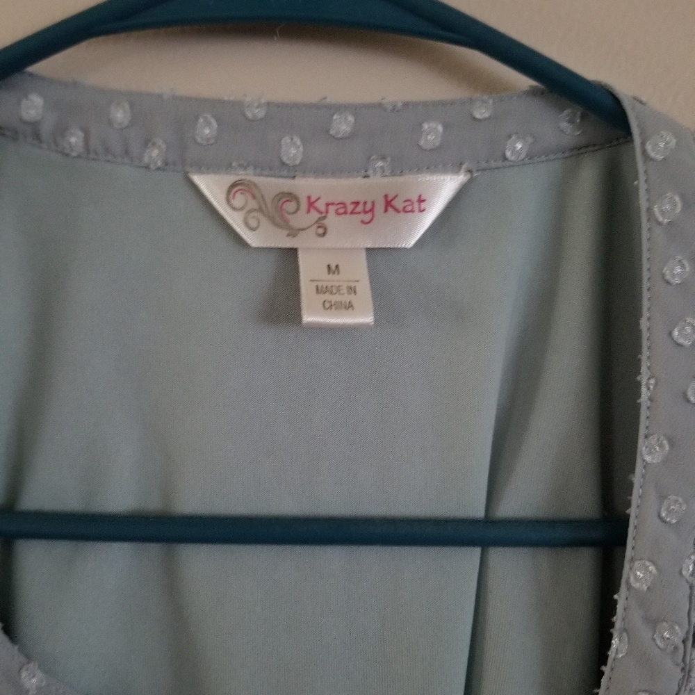 Button up top - Picture 4 of 4